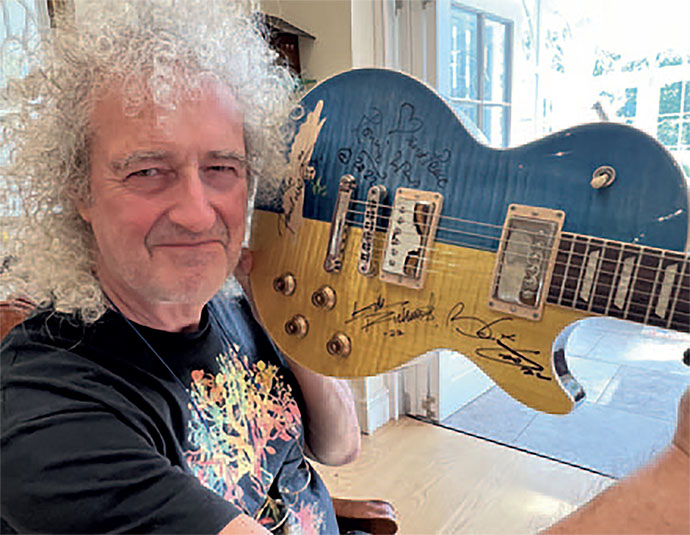 bri_with_blue_yellow_gibson_lp_690x536.jpg